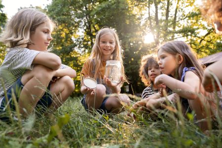 full-shot-kids-sitting-grass